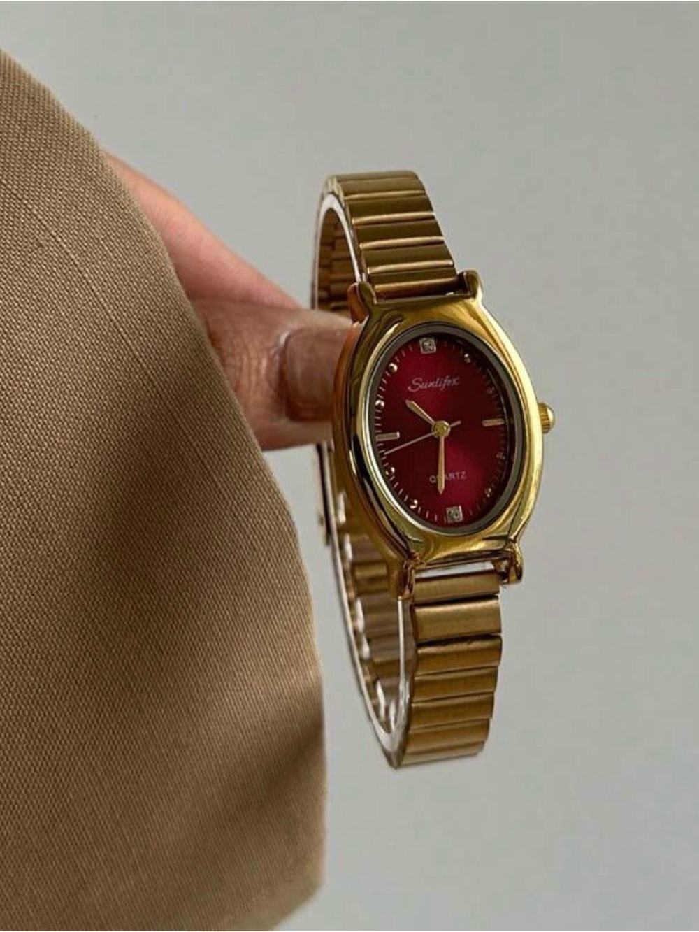 Gold-Tone Watch with Red Dial